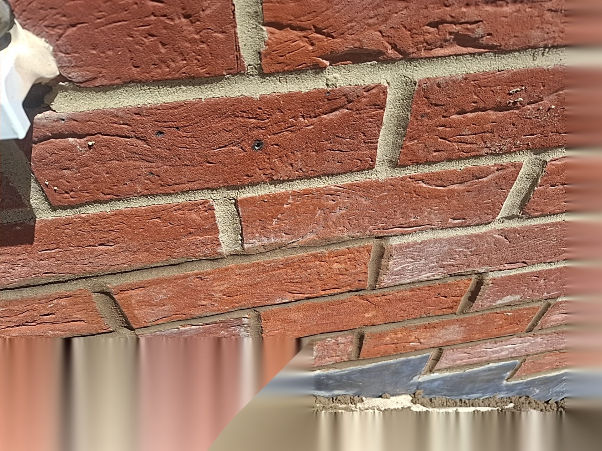 Detail of finished red facing brickwork and weather detailing on a South Yorkshire brickwork project