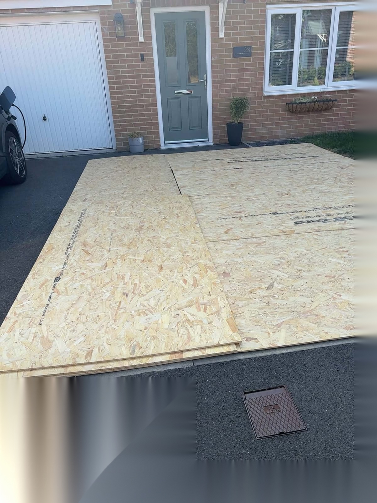 Driveway and forecourt boarded over for protection during a Doncaster driveway installation