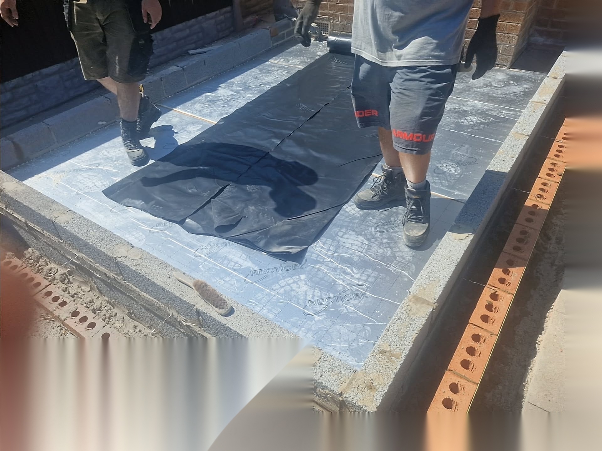 Membrane and materials installed within a brick and block structure during substructure groundworks