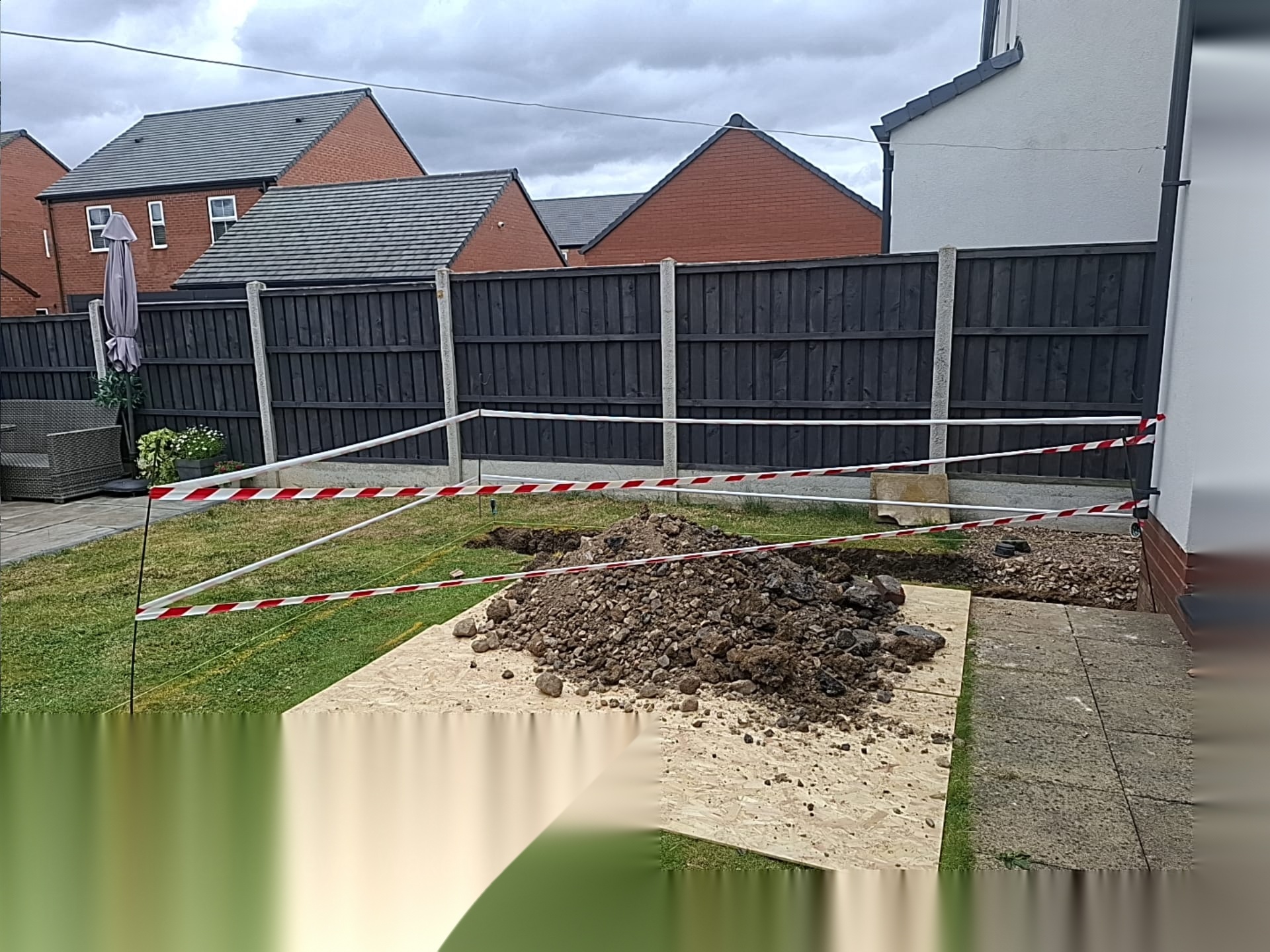 Garden cordoned off and excavated ready for groundworks on a Doncaster residential project