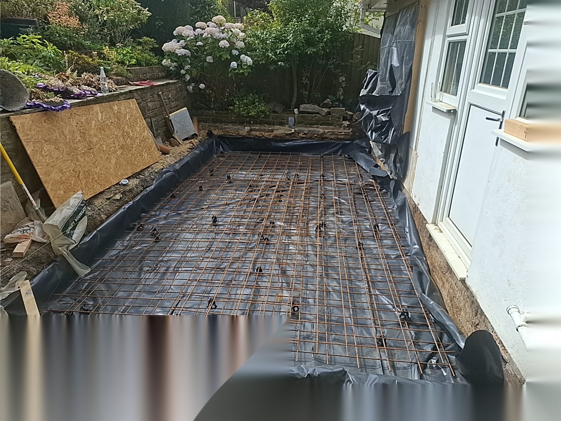 Steel reinforcement mesh laid over membrane on a prepared base ready for a concrete pour